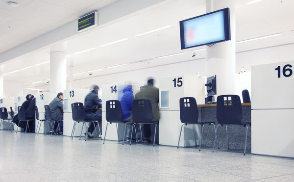 depositphotos_18860591 stock-photo-public-in-tax-office